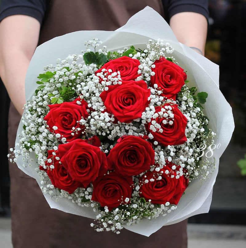 One Dozen Roses Designed with Baby Breath Wrap